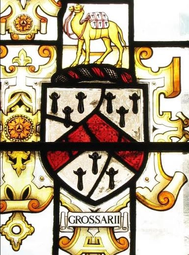 Stained glass window showing the Grocers' Company camel crest